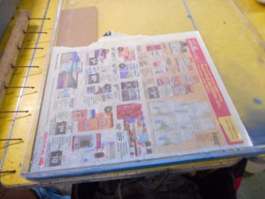 Using large newspaper as skim