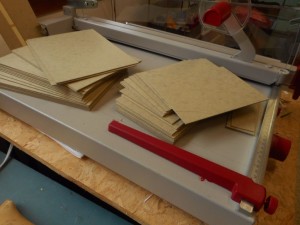 Stacks of cut Davey board for covers